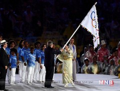 Олимпийн далбааг Токиод гардуулан өглөө 