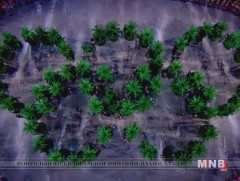 Олимпийн таван цагираг ногоон өнгөөр гэрэлтэв 