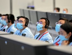 БНХАУ-ын “Шэньжөү-14” хөлгийн баг сансрын бүхээгтээ амжилттай шилжин оржээ