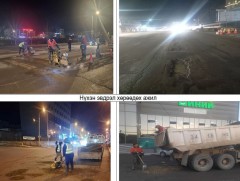 Замын эвдрэлийг засварлаж байна