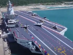 БНХАУ дотооддоо үйлдвэрлэсэн анхны нисэх онгоц тээвэрлэгч хөлөг онгоцоо танилцууллаа 